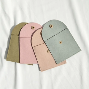 Microfiber jewelry envelope pouches with snap buttons in four pastel assorted colors
