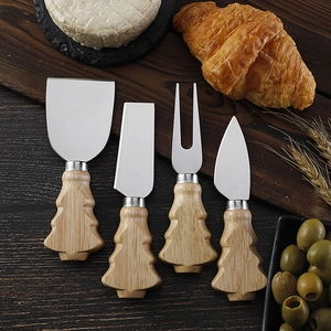 Detail view of 4-piece stainless steel cheese knife set with Christmas tree wood handles
