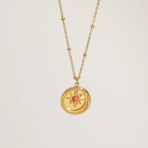 Collar celestial vintage francés con colgante sol luna oro e incrustación piedra rosa