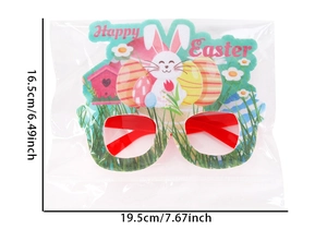 Detail of Happy Easter glasses with bunny and colorful egg motifs on a white background