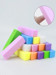 Vue détaillée des blocs polissoir à ongles 120 grains montrant la texture et la souplesse