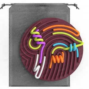 Macro detail of sensory activity board with colorful 3D tubes and mesh storage bag