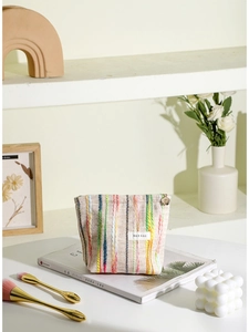 Trousse à maquillage rayée arc-en-ciel avec fermeture fleur et étiquette de marque tissée