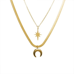 Double-layered gold titanium necklace with star and moon charms on herringbone chain