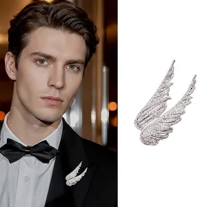 Elegant silver angel wing brooch with crystals for suits, lifestyle and detail view