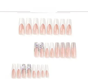 Detail of French white tip nails with 3D flowers, rhinestones and silver glitter gradients