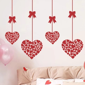 Red heart-shaped window clings with ribbon and bow designs for Valentine decoration