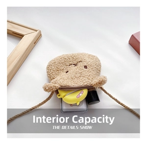 Detail view of the soft plush crossbody bag interior showing daily items capacity