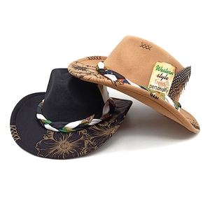 Western wool felt cowboy hats in black and camel with gold peacock feather floral prints