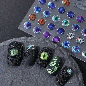Detailed macro view of 3D dragon eye nail art stickers TH-128 with realistic textures