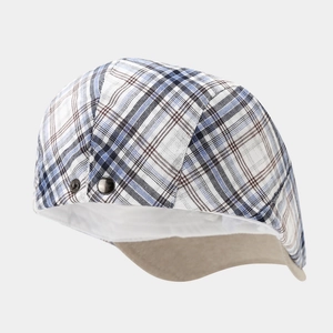 Classic blue and black plaid ivy cap with vintage side metal buckle on grey background