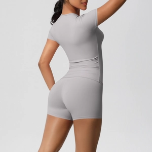 Detailed back view of grey high-stretch yoga set with slim fit top and shorts