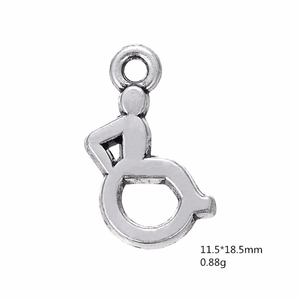 Macro view of silver handicap wheelchair charm with 11.5x18.5mm size specifications