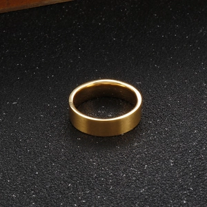 Detailed top view of 6mm wide gold plated ring featuring matte exterior and polished inner band