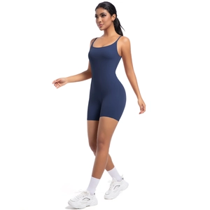 Side view of dark blue ribbed yoga bodysuit with thin straps and body-sculpting fit