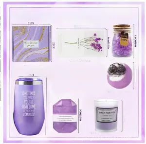 Purple spa gift set with vacuum cup, scented candle, bath salt, and soap in a gift box