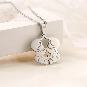 Silver stainless steel necklace pendant featuring an openwork twin babies design