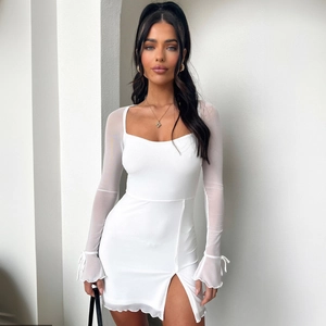 Detail of square neckline and mesh long sleeves with bow ties on white dress