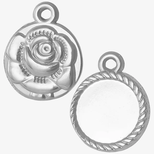 Macro detail of 304 stainless steel rose relief charms and round DIY pendant settings