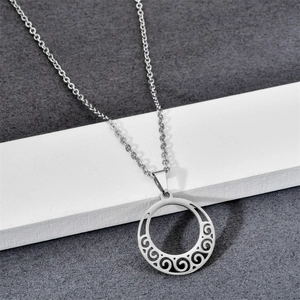 Stainless steel necklace with a round cutout spiral pattern pendant for men and women