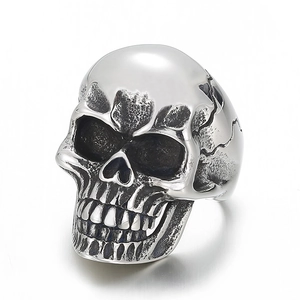 Mens rock punk style silver skull ring made of durable stainless steel on white background