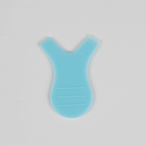 Blue Y-shaped silicone brush for eyelash lifting and perming on white background