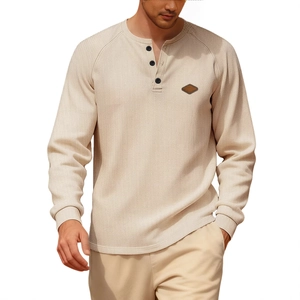 Men's waffle knit long sleeve henley shirt in beige with three buttons and leather patch