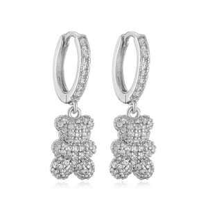 Sparkling silver teddy bear drop earrings with micro-pave crystals on white background