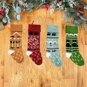 Set of 4 knitted Christmas pet stockings with bone and cat patterns for fireplace decor