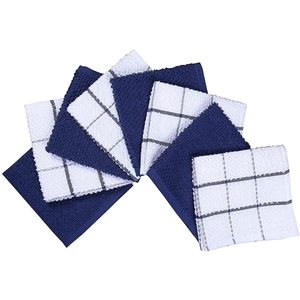 Macro detail of blue and white checkered cotton kitchen towels in a fan-shaped layout