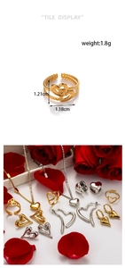 Detailed interlocking heart ring dimensions measuring 1.21cm by 1.18cm in gold finish