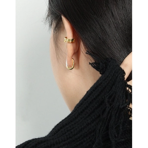 Minimalist S925 sterling silver geometric hoop earrings in gold finish on female model