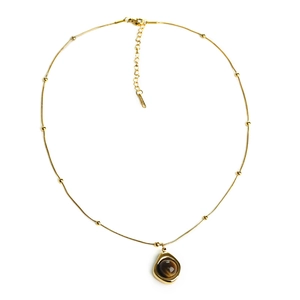 Vintage stainless steel tiger eye necklace with irregular geometric pendant on gold chain