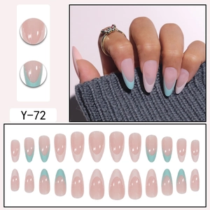 French manicure press-on nails in long oval shape with nude pink and light blue tips