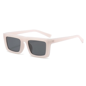 Rectangular thick frame sunglasses in cream pink with dark grey lenses in a retro style