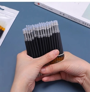 Detailed view of bulk 0.5mm black gel pen refills with protective wax tips