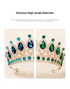 Close-up of handmade gold metal crown with teardrop sapphire and emerald crystals
