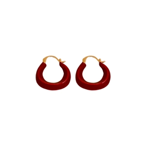 Minimalist red enamel U-shaped hoop earrings with gold plating on a clean white background