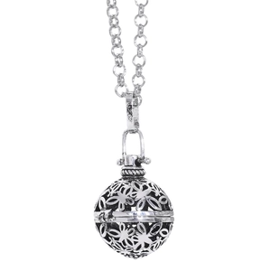 Vintage silver hollow spherical locket necklace with intricate floral patterns