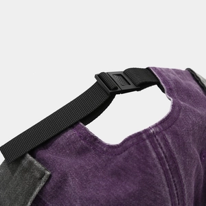 Close-up of adjustable buckle and strap on vintage washed purple cotton docker cap