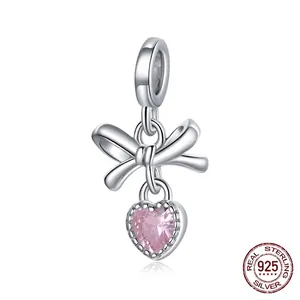 Sterling silver 925 bow charm with a pink heart shaped zircon stone for DIY bracelets
