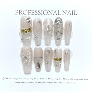 Pink gradient handmade press-on nails with luxury rhinestones and pearl accents