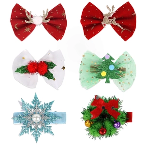 Detailed set of six Christmas hair clips with velvet bows, reindeer antlers, and trees