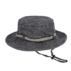 Dark grey washed cotton bucket hat with wide brim and adjustable chin strap for outdoors