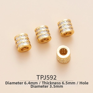 Detail of gold brass spacer beads with cubic zirconia, size 6.4mm for jewelry DIY