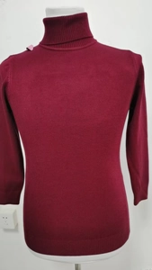 Detail of burgundy turtleneck sweater featuring ribbed knit cuffs and a slim fit design