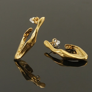 Irregular 18K gold plated stainless steel stud earrings with abstract lava texture
