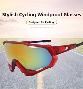 Detail of red cycling sunglasses with colorful polarized lenses on a road background