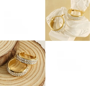 Macro detail of gold hoop earrings with double-row crystals and polished finish