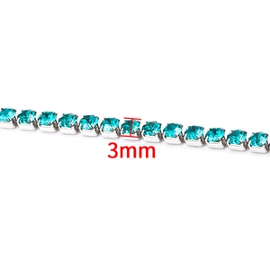 Macro view of 3mm cyan rhinestone claw chain with silver metal base for jewelry DIY